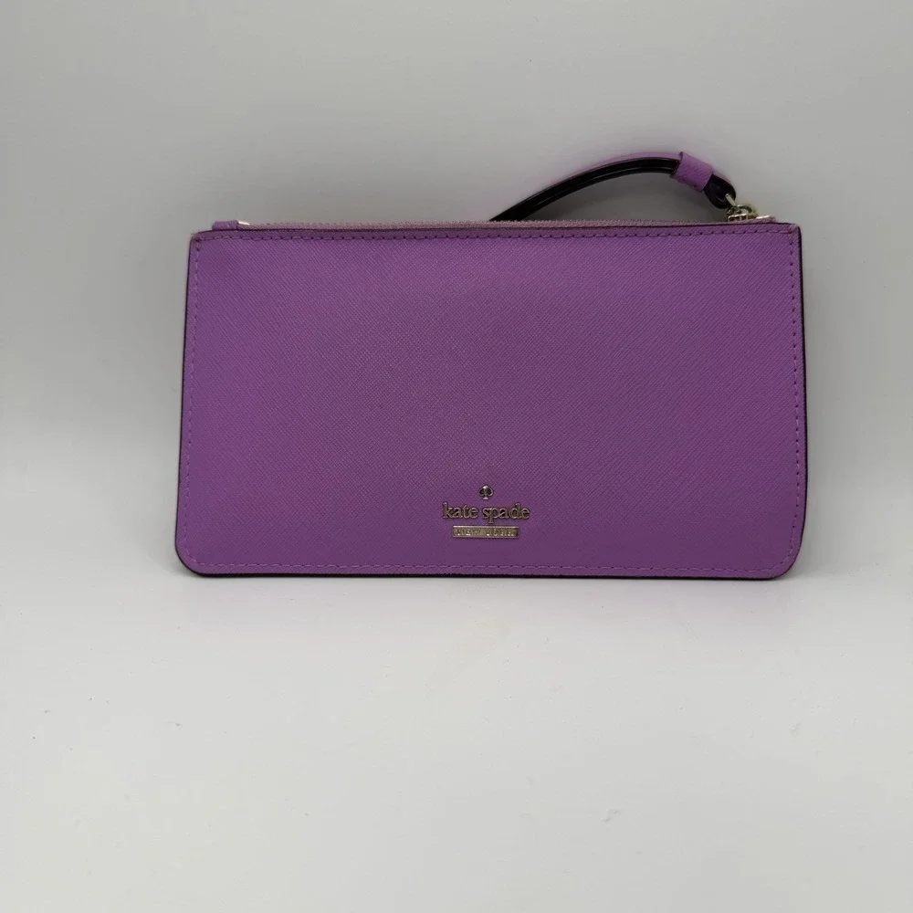 Kate Spade New York purple leather wristlet.